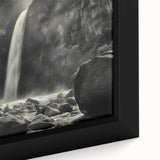 Close-up of a framed canvas wall art featuring a striking landscape design with textured rocks and natural hues, perfect for enhancing home decor.