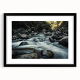 Framed wall art showcasing a serene landscape with rocky formations, featuring a black frame and mat, ideal for modern home decor and interior design enthusiasts.