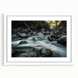 Framed landscape wall art featuring a serene rocky terrain design, set in a white mat and frame, ideal for enhancing home decor with natural beauty.