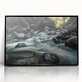 Framed acrylic wall art featuring a modern landscape design with rocky terrain, highlighted by a black frame, perfect for contemporary home decor.