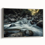 Framed canvas wall art featuring a serene landscape with textured rocks and vibrant colors, showcasing a silver frame, ideal for modern home decor.