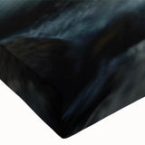 Close-up of a stretched canvas wall art piece showcasing a vibrant, abstract landscape design with bold colors and intricate rock textures, perfect for modern decor.