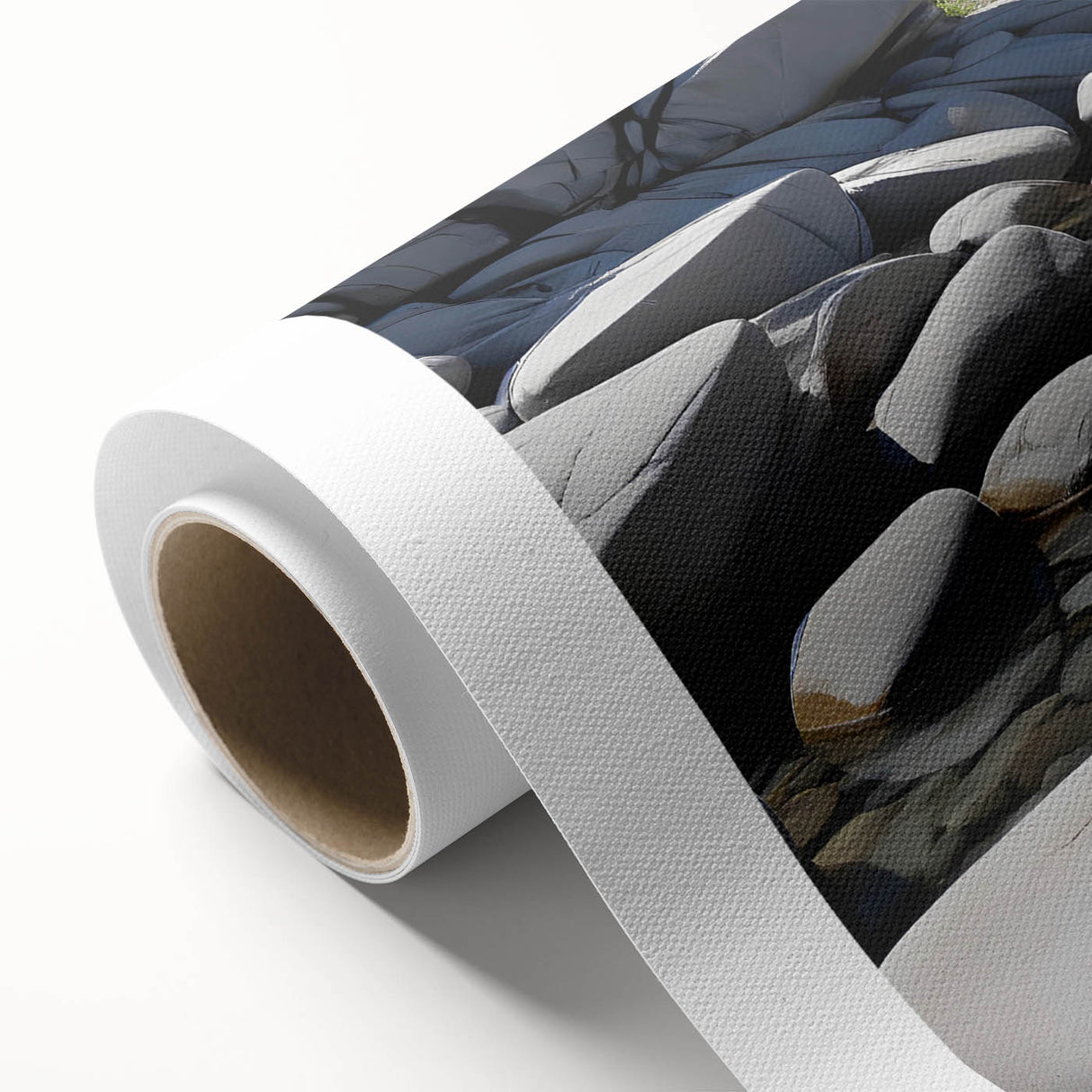 Rolled canvas artwork showcasing a vibrant landscape design with rocky formations, ideal for home decor. Packaged securely in a durable cardboard tube for protection.
