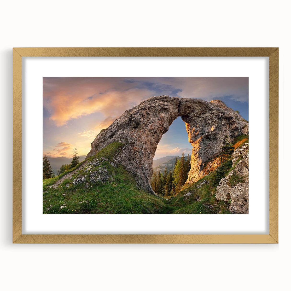 Framed wall art featuring a scenic landscape design with rocky formations and warm earthy tones, elegantly bordered with a gold mat, perfect for home decor.