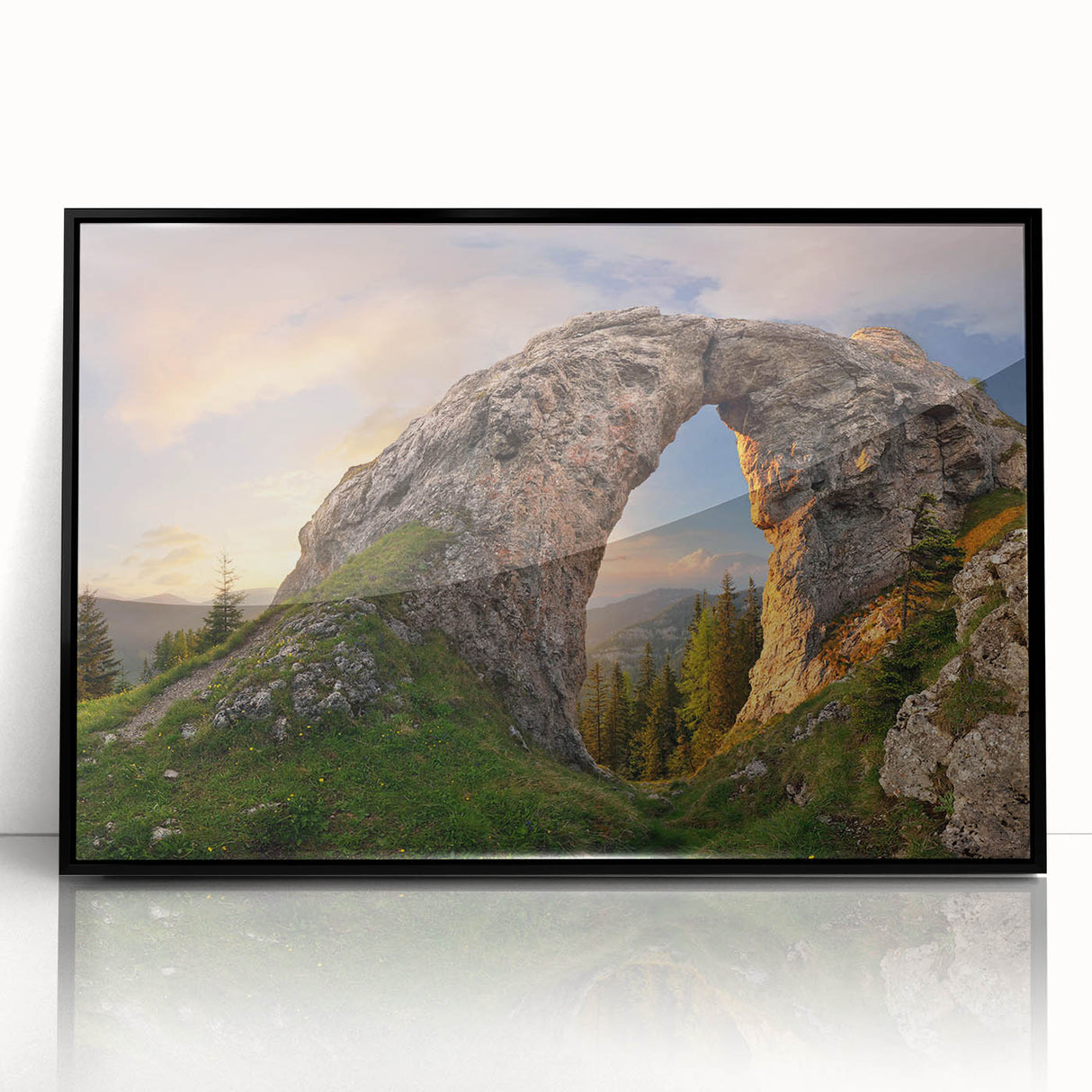 Framed acrylic wall art featuring a serene landscape with rugged rocks and vibrant colors, designed to enhance modern home decor, showcased in a sleek black frame.