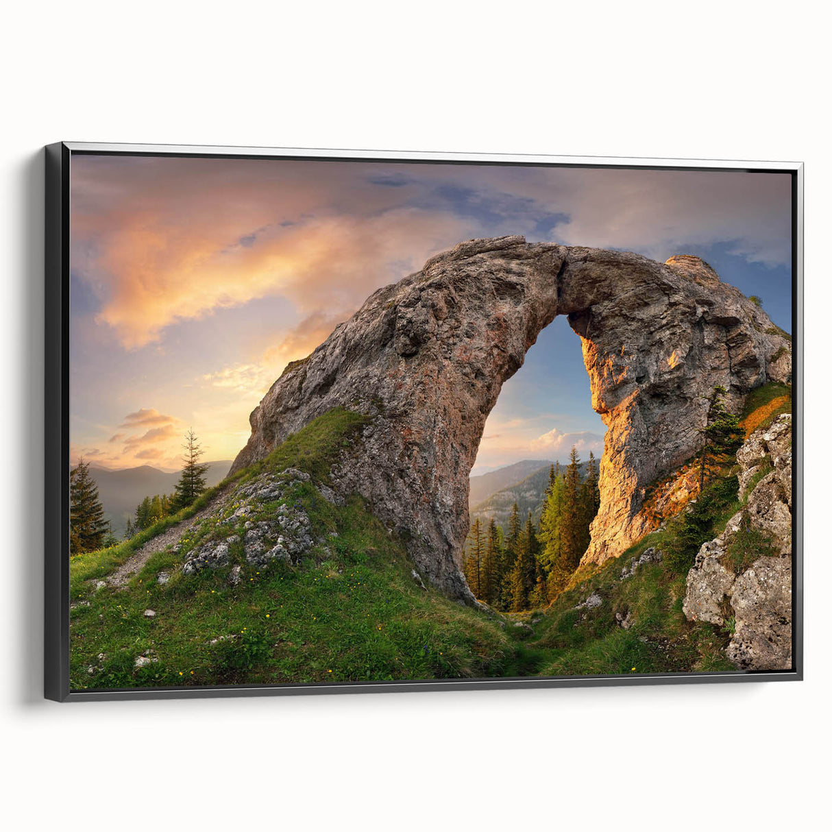 Framed canvas wall art showcasing a stunning landscape design with rocky formations, featuring a sleek black frame in a side view that highlights its elegant presentation.