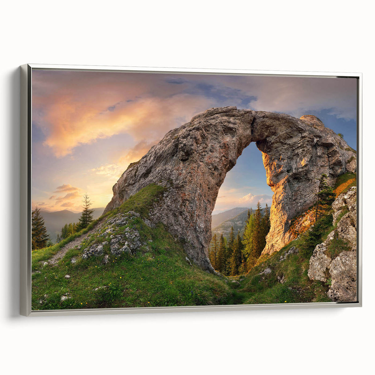 Framed canvas wall art showcasing a scenic landscape with rocky formations, designed in a modern style with a silver frame, perfect for contemporary home decor.