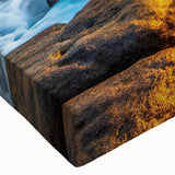 Stretched canvas wall art showcasing a close-up of a rugged landscape with textured rocks, perfect for modern home decor and nature-inspired interiors.