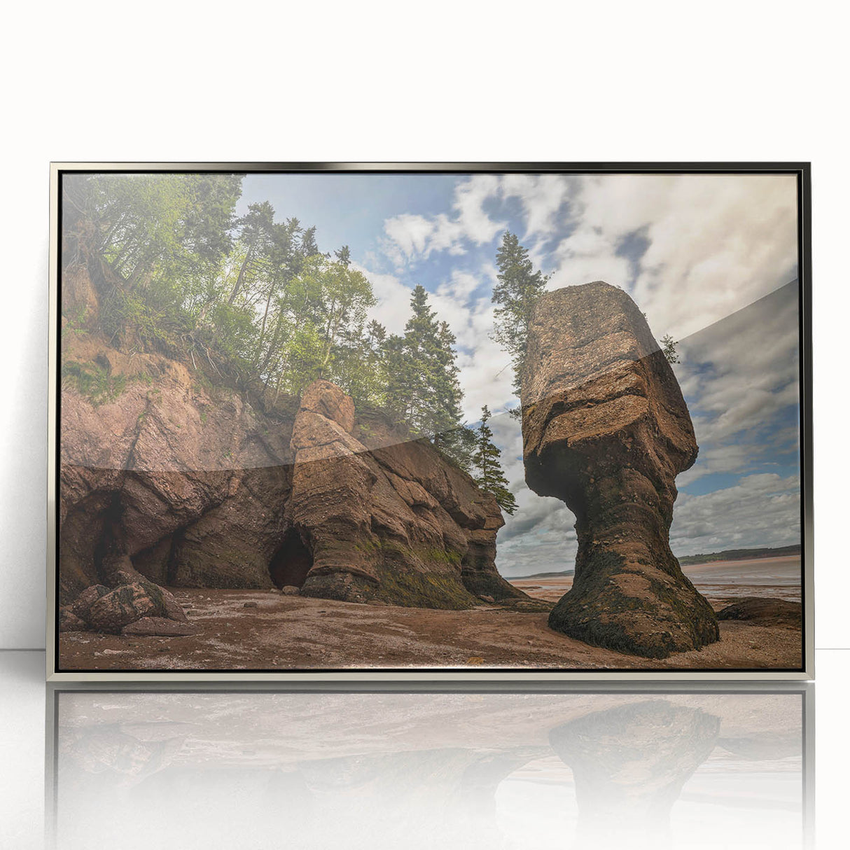 Framed acrylic wall art featuring a striking landscape design showcasing rugged rocks and vibrant colors, perfect for modern home decor.
