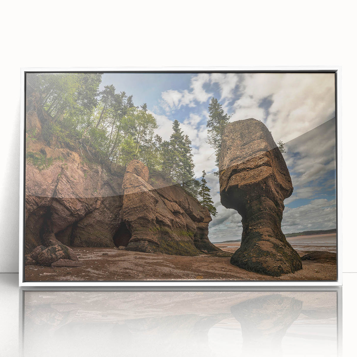 Framed acrylic artwork showcasing a stunning landscape with rocks, featuring a white border and sleek design, perfect for modern home decor.