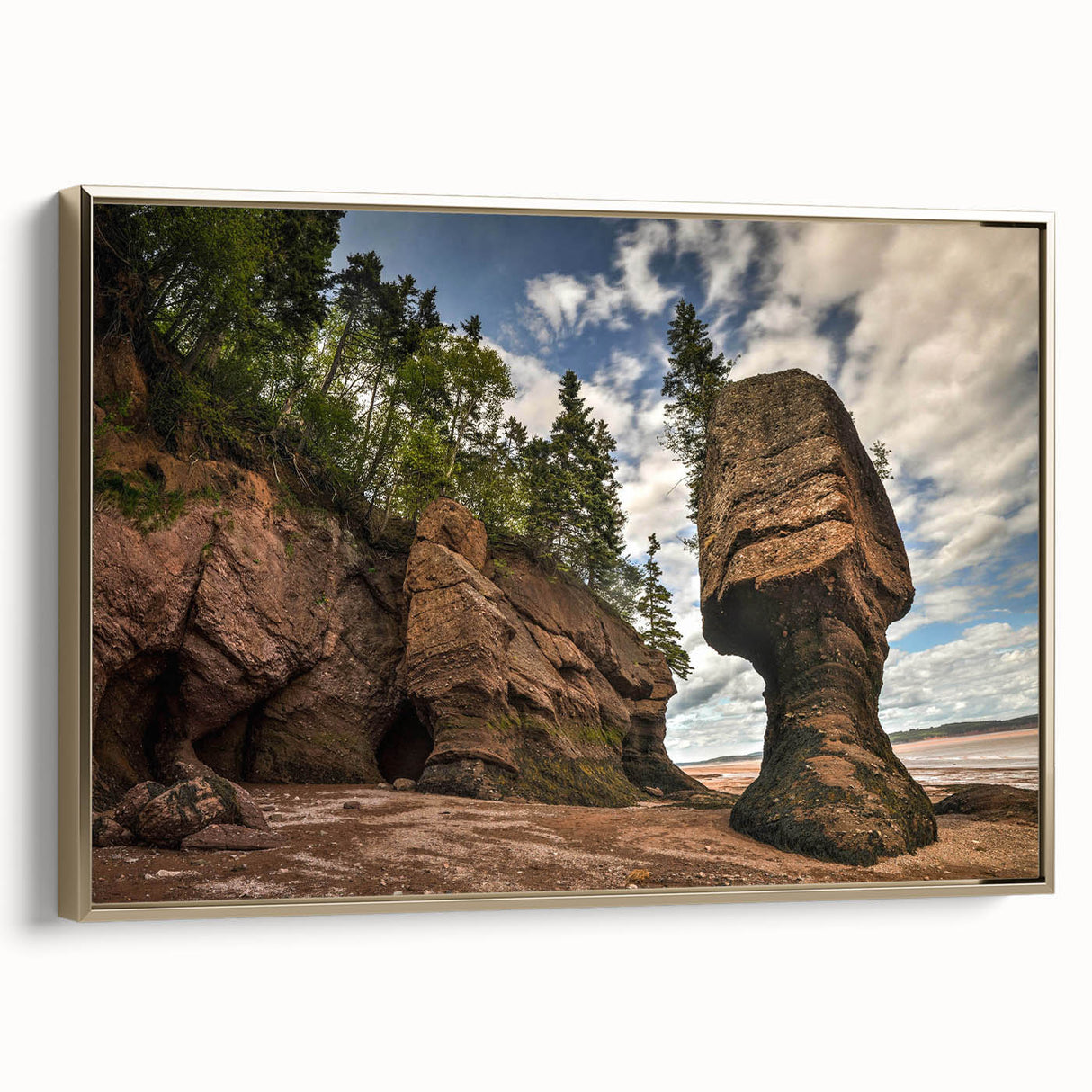 Framed canvas wall art featuring a contemporary landscape design with rocks and gold accents, displayed in a stylish setting, ideal for modern home decor.