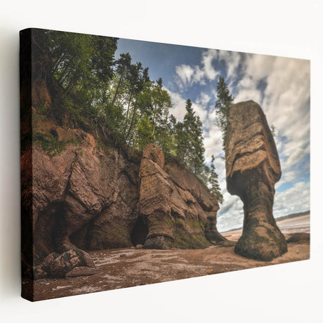 Stretched canvas wall art showcasing a serene landscape with rocky formations and vibrant colors, ideal for modern home decor. The side view highlights its depth and texture, making it a captivating focal point for any room.