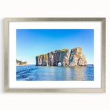 Framed wall art collection showcasing a serene landscape with rocks and natural elements, featuring a sleek silver frame and white mat, perfect for modern decor.