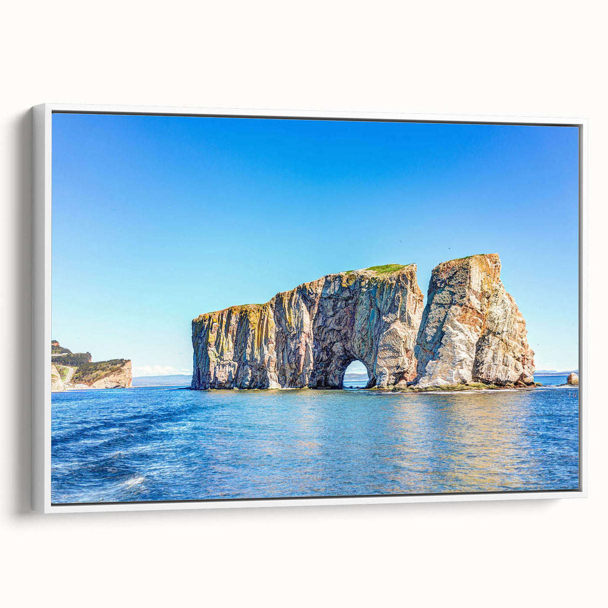 Framed canvas wall art showcasing a serene landscape with textured rocks and soft white tones, adding elegance to modern interiors. Perfect for enhancing decor.