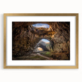 Elegant framed wall art collection showcasing serene landscapes with textured rock designs, featuring a stylish gold frame and mat, ideal for enhancing home decor.