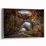 Framed canvas wall art showcasing a stunning landscape with textured rocks and serene colors, elegantly presented with a silver frame, perfect for modern decor.