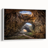 Framed canvas wall art showcasing a serene landscape with textured rocks and soft colors, ideal for modern home decor. Side view highlights the elegant frame and artistic details.