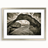 Framed wall art collection showcasing a serene landscape with rocks, presented in a silver frame with a mat, perfect for modern home decor.