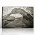 Framed acrylic wall art featuring an abstract landscape design with vibrant colors and textured rocks, set against a sleek black frame for modern decor. Perfect for enhancing interior spaces with artistic flair.