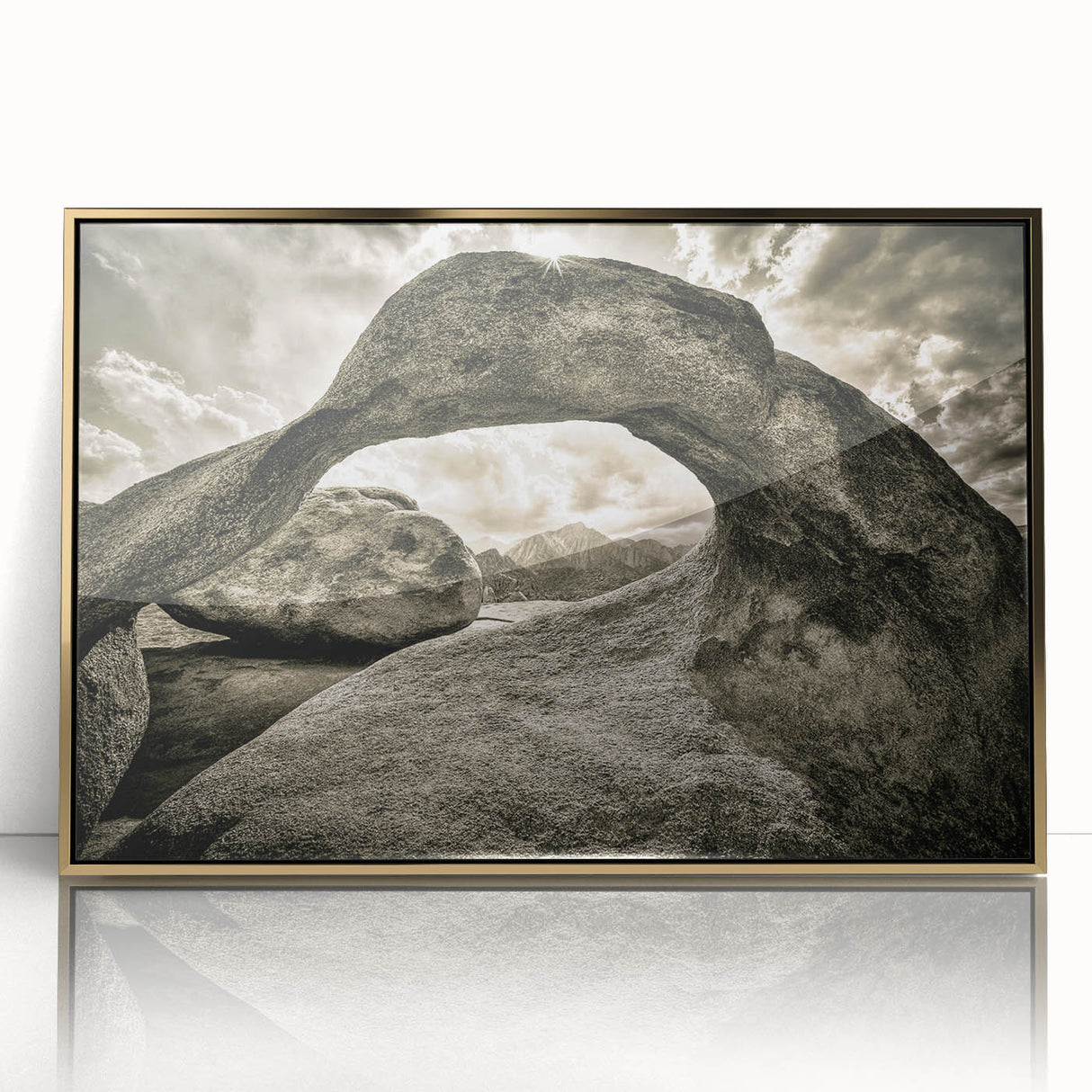 Framed acrylic wall art showcasing a striking landscape with textured rocks and a gold frame, ideal for modern home decor and enhancing interior aesthetics.