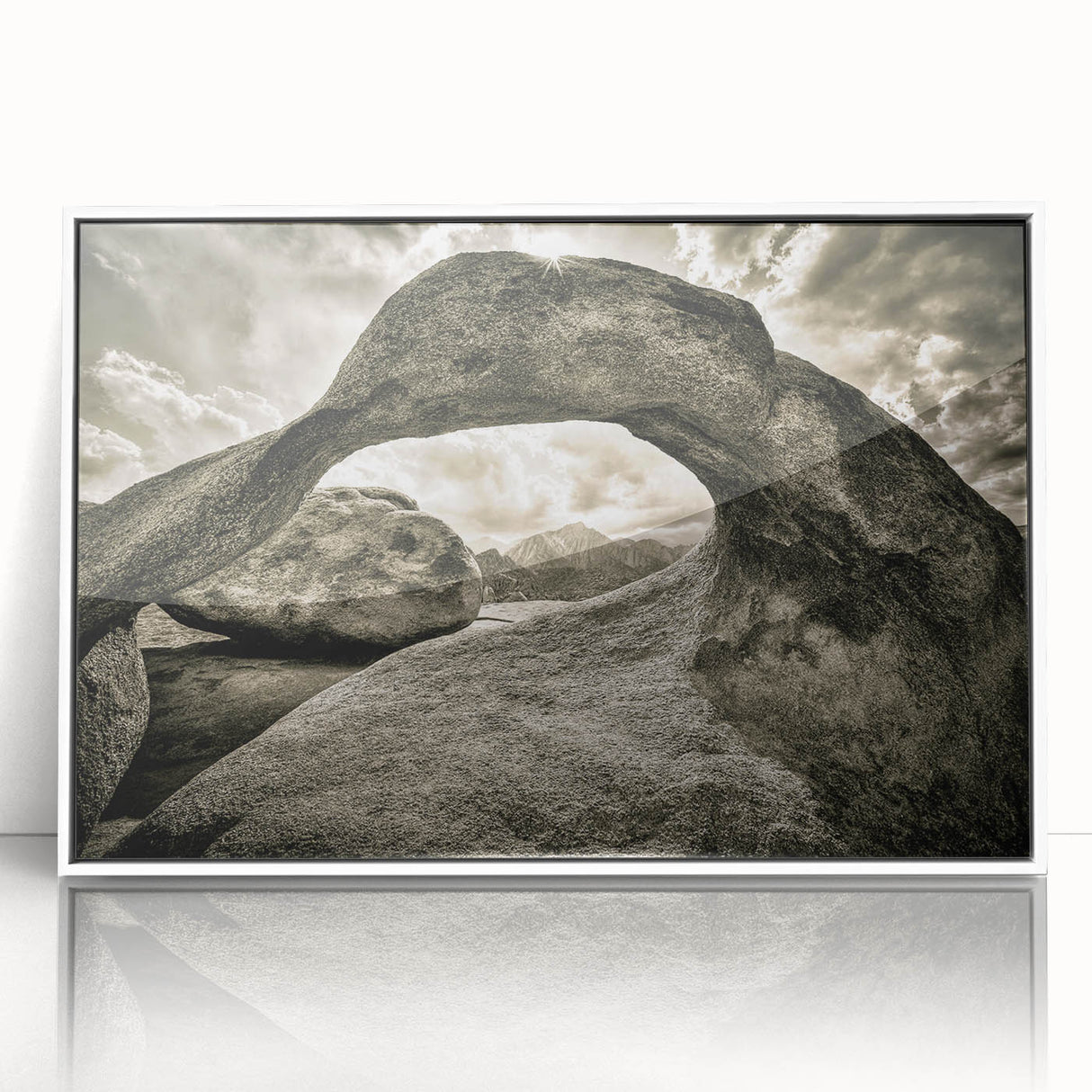 Framed wall art featuring a vibrant landscape design with rocks, showcasing a modern aesthetic. The artwork is presented in a sleek white frame, ideal for enhancing contemporary home decor.