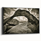 Framed canvas wall art showcasing a contemporary landscape design featuring textured rocks and earthy tones, presented in a sleek black frame for modern decor.