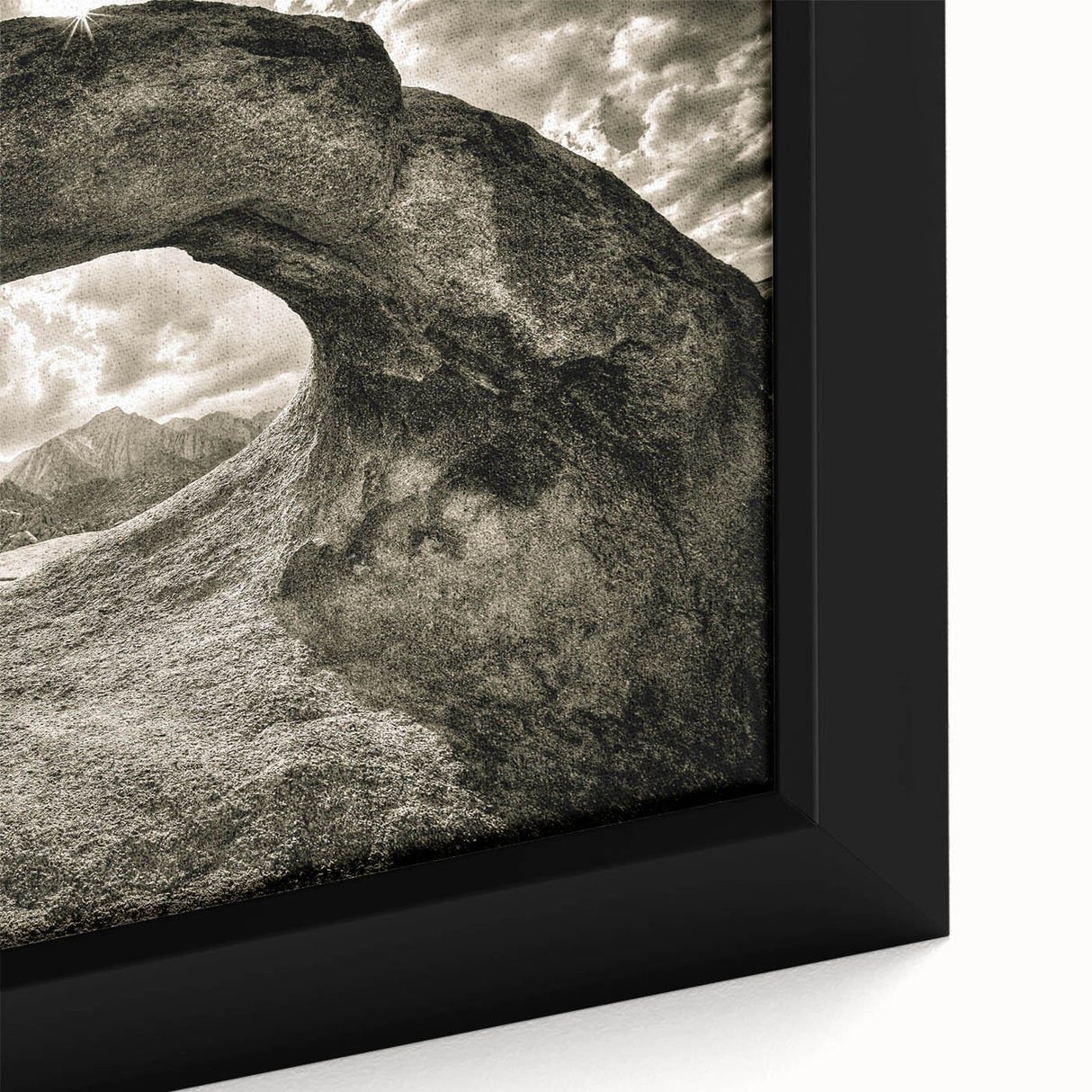Close-up of a framed canvas wall art piece showcasing a vibrant landscape design with intricate rock formations and a natural color palette, ideal for home decor.