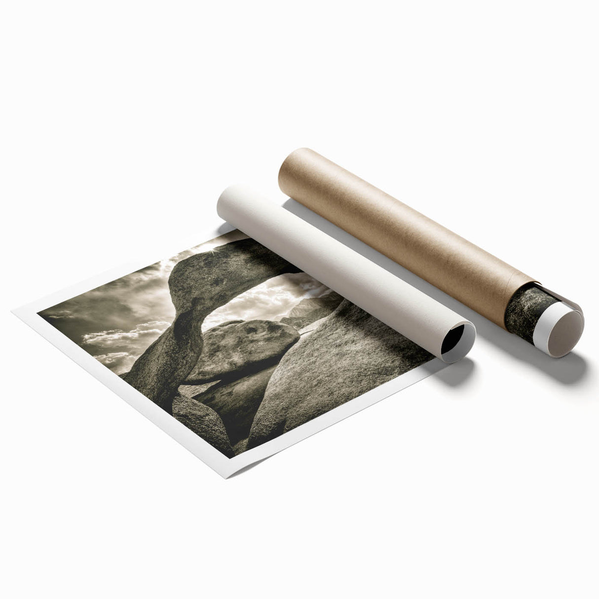 Rolled print of a serene landscape showcasing majestic rocks and vibrant greenery, perfect for home decor. Packaged securely in a cardboard tube for safe delivery.