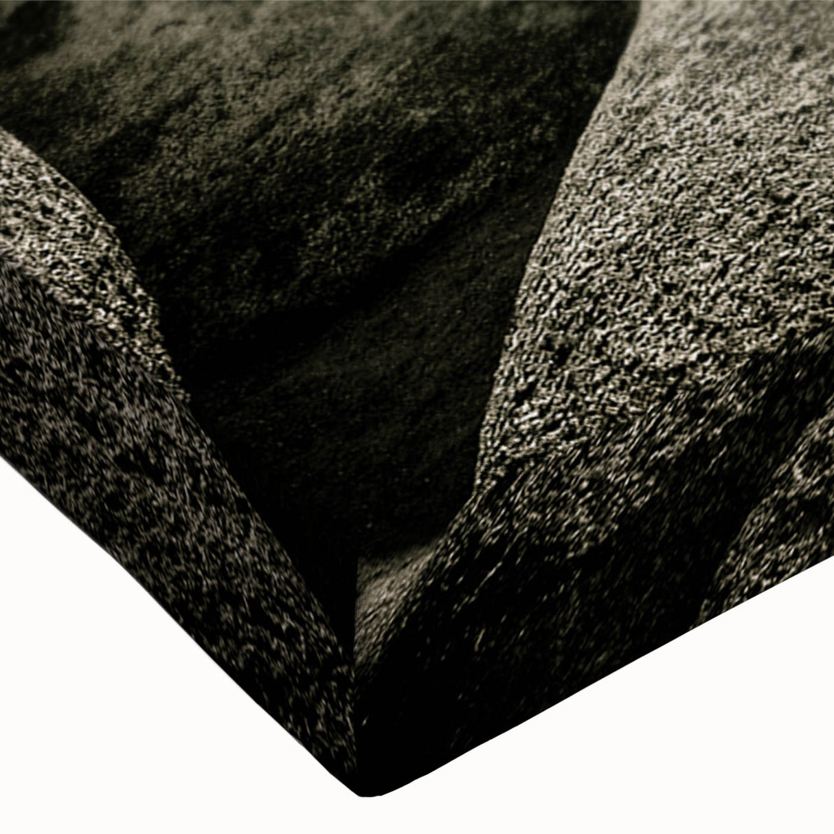 Close-up of a textured stretched canvas featuring a contemporary rock landscape design, showcasing earthy tones and intricate details, ideal for modern home decor.