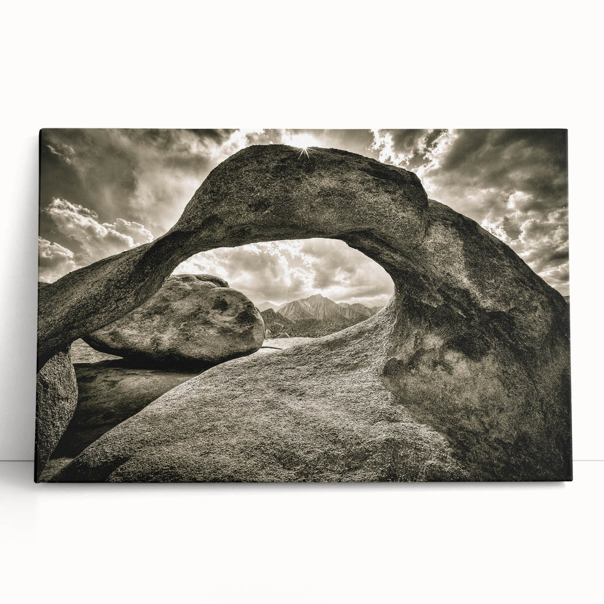 Stretched canvas wall art showcasing a serene landscape of rocks and mountains with a calming color palette, perfect for modern home decor and interior design inspiration.