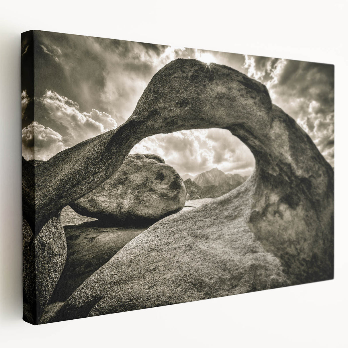 Stretched canvas wall art showcasing a tranquil landscape with rocky formations and soft pastel colors, adding a serene touch to any home decor.