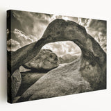 Stretched canvas wall art showcasing a tranquil landscape with rocky formations and soft pastel colors, adding a serene touch to any home decor.