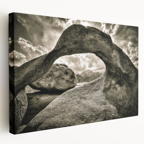 Stretched canvas wall art showcasing a tranquil landscape with rocky formations and soft pastel colors, adding a serene touch to any home decor.