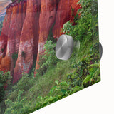 Close-up of a vibrant acrylic wall art piece showcasing abstract landscapes with textured rock formations, perfect for modern home decor.