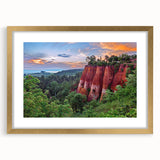 Framed landscape wall art featuring a serene rocky scene, adorned with elegant gold accents and a white mat, perfect for enhancing modern home decor.