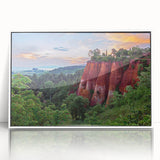 Framed acrylic wall art featuring a serene landscape with rocks, set in a sleek white frame, perfect for enhancing modern home decor with natural beauty.