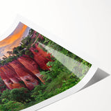 Rolled print of a serene landscape featuring textured rocks and lush greenery, ideal for home decor, showcasing natural beauty in vibrant colors.