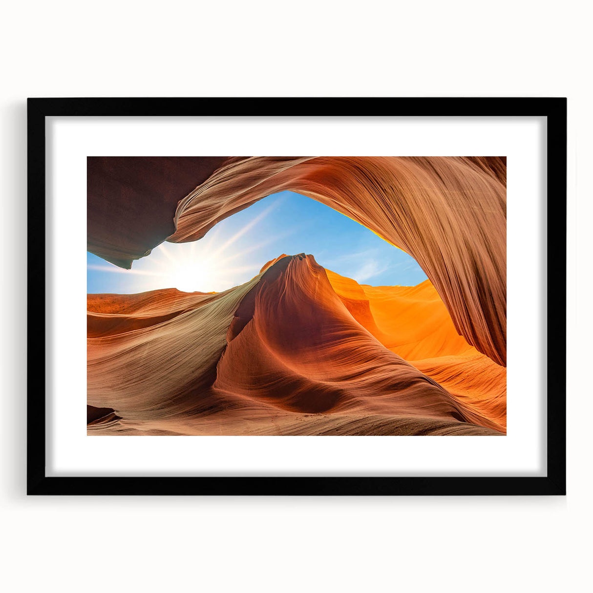 Framed wall art featuring a stunning landscape design with rocks, presented in a sleek black frame with a mat, ideal for modern home decor.