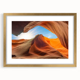 Framed wall art depicting a serene landscape with intricate rock formations, accented by a gold frame and matting, ideal for modern home decor. The artwork evokes tranquility and complements various interior styles.