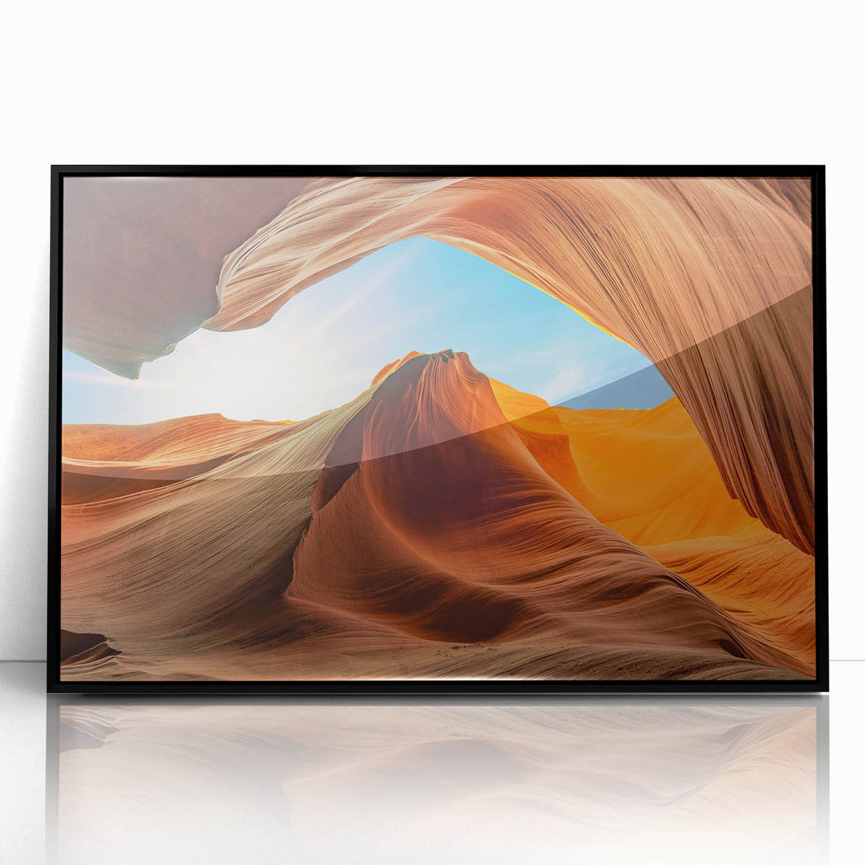 Framed acrylic wall art showcasing a stunning landscape design with intricate rock formations, presented in a sleek black frame, ideal for modern home decor.