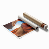 Vibrant rolled print of a landscape featuring intricate rocky formations and earthy tones, perfect for home decor, showcasing nature's beauty in a modern design.
