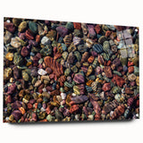 Acrylic glass wall art featuring a modern landscape design with colorful rocks in vibrant hues. Showcasing a side view, it includes decorative pins for easy display.