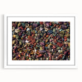 Framed landscape wall art featuring a serene rocky terrain design, set in a sleek white mat, perfect for enhancing modern home decor.