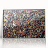 Framed acrylic wall art displaying a striking landscape design featuring rugged rocks against a serene backdrop, designed to enhance any modern interior decor.