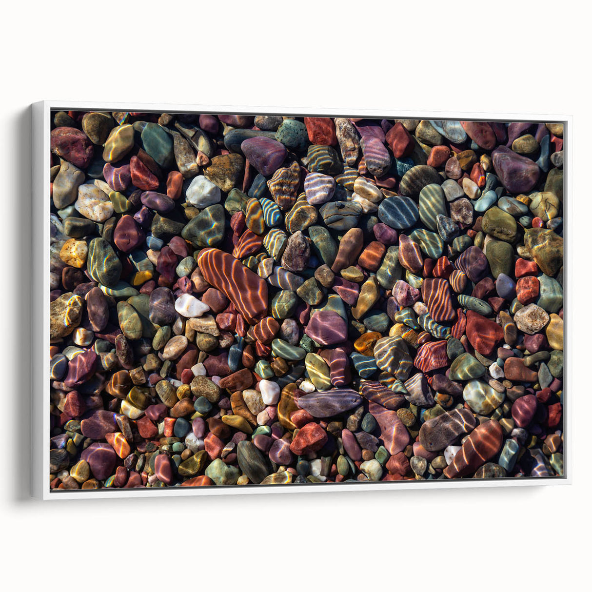 Framed canvas wall art showcasing a contemporary landscape design with textured rocks and earthy tones, elegantly displayed in a white frame, ideal for modern home decor.