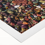 Rolled canvas artwork showcasing a vibrant landscape with textured rocky formations and a colorful sky, ideal for home decor and art enthusiasts.