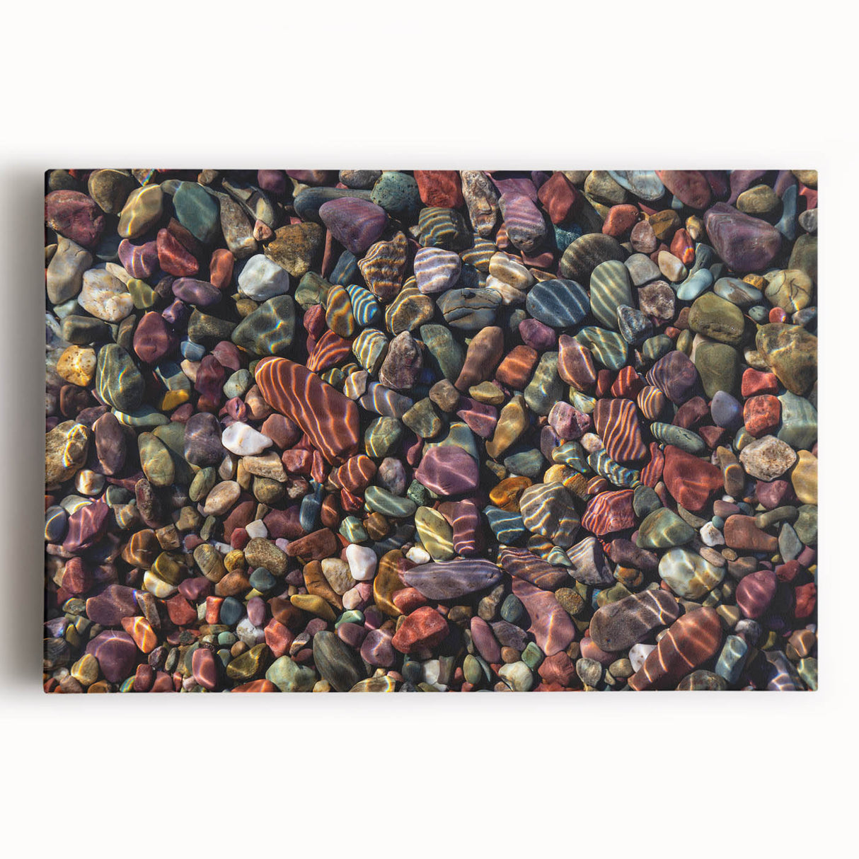 Stretched canvas wall art featuring a vibrant landscape design with textured details, showcasing rocky cliffs under a blue sky, perfect for modern decor.