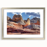 Framed wall art collection featuring a serene landscape design with rocky cliffs, set in a silver frame with matting. Perfect for home decor enhancement.
