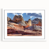Framed wall art collection showcasing a serene landscape design with rocky formations, highlighted by a white mat and elegant frame, perfect for home decor.