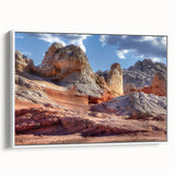 Framed canvas wall art showcasing a modern landscape design with intricate rock formations, featuring a white frame and side view, perfect for contemporary decor.